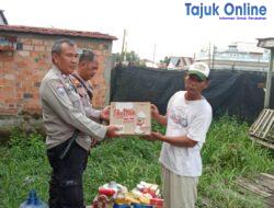 Polsek Kertapati Berikan Bansos Kepada Warga Kemang Agung